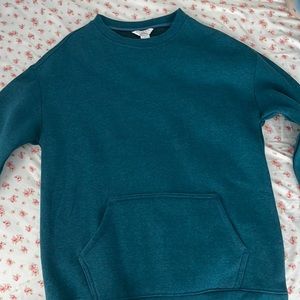 perfect condition unused teal sweater brand is dan skin